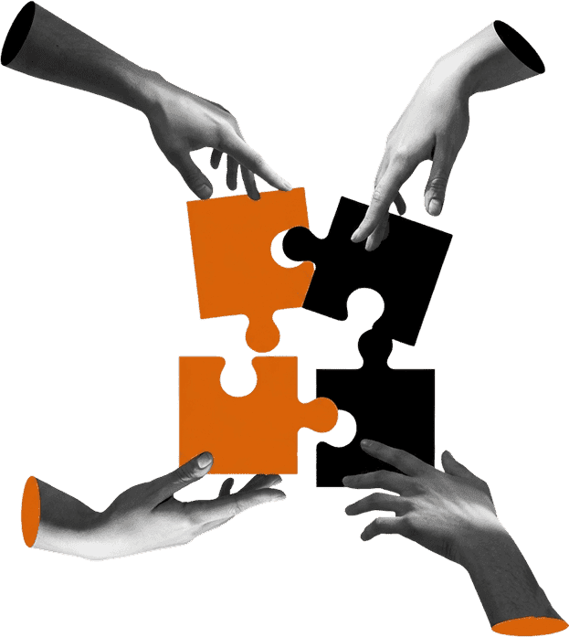 Hands assembling puzzle pieces representing shared values